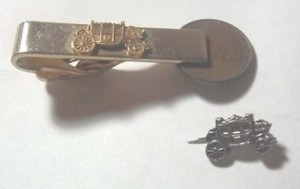 FISHER BODY TIE BAR AND LAPEL PIN